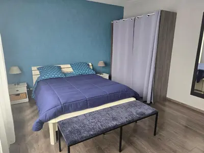 Un ou plusieurs lits dans un hébergement de l'établissement Bel appartement 3 pièces dans une résidence calme