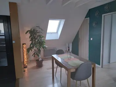 Coin salon dans l'établissement Le repos du facteur