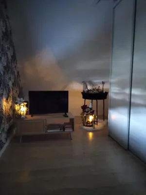 Télévision ou salle de divertissement dans l'établissement Le repos du facteur