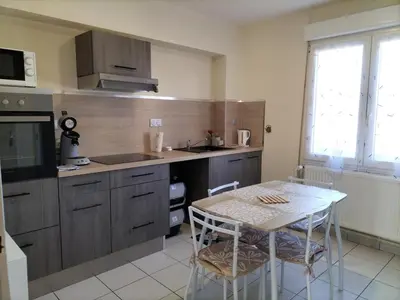 Cuisine ou kitchenette dans l'établissement Escale