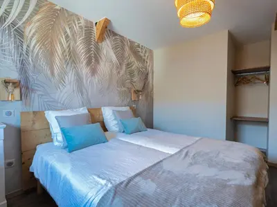 Un ou plusieurs lits dans un hébergement de l'établissement Les loges de Marianne, gites d'exception proche Europapark