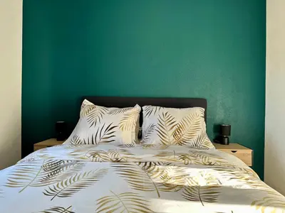 Un ou plusieurs lits dans un hébergement de l'établissement Flori'Home