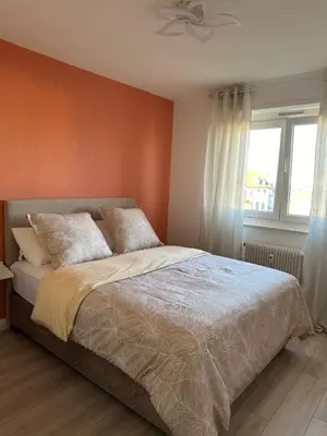 Un ou plusieurs lits dans un hébergement de l'établissement Flori'Home