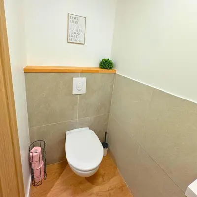 Salle de bains dans l'établissement Grand appartement chaleureux
