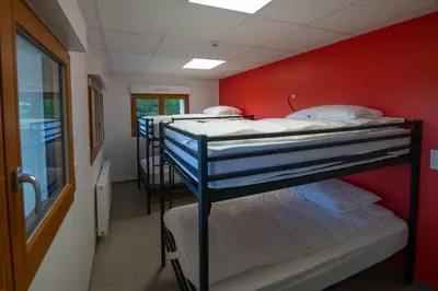 Un ou plusieurs lits dans un hébergement de l'établissement Le chalet de l'amicale