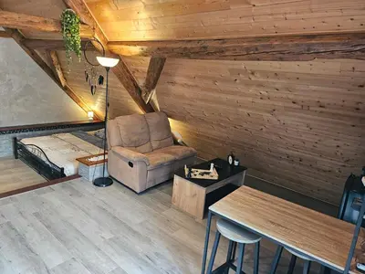 Coin salon dans l'établissement Les Hauteurs de Ranspach