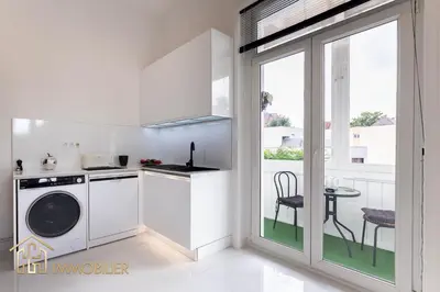 Cuisine ou kitchenette dans l'établissement Le Premium - Parking City Center