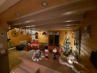 Coin salon dans l'établissement Chalet Les Bouvreuils La Bresse Haute Vosges