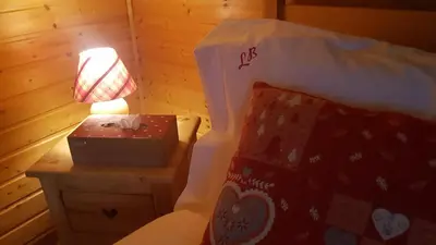 Un ou plusieurs lits dans un hébergement de l'établissement Chalet Les Bouvreuils La Bresse Haute Vosges