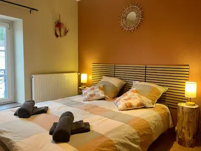Un ou plusieurs lits dans un hébergement de l'établissement Cocon de la belle de Vosges 3 chambres