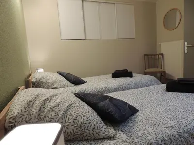 Un ou plusieurs lits dans un hébergement de l'établissement Cocon de la belle de Vosges 3 chambres