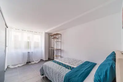 Un ou plusieurs lits dans un hébergement de l'établissement Appartement Bandjoun - Pour 4 à Mulhouse