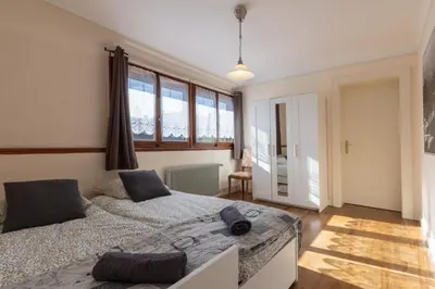 Un ou plusieurs lits dans un hébergement de l'établissement Appartement Lino - base idéale pour explorer l'Alsace, emplacement privilégié entre vignes et Vosges