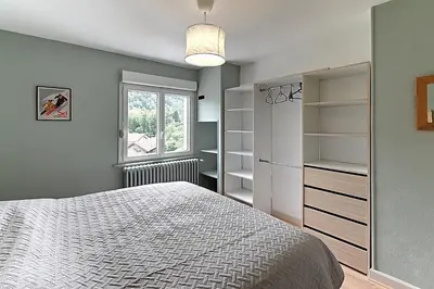 Un ou plusieurs lits dans un hébergement de l'établissement Le Cocoon Clairefontaine - Maison vue montagne