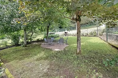 Jardin de l'établissement Le Cocoon Clairefontaine - Maison vue montagne