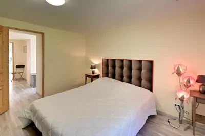 Un ou plusieurs lits dans un hébergement de l'établissement Le Kichompré - Appt 50 m² vue montagne