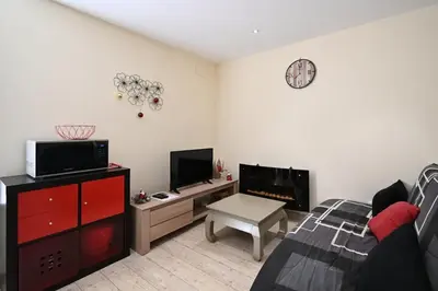 Télévision ou salle de divertissement dans l'établissement Le Kichompré - Appt 50 m² vue montagne