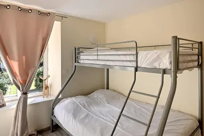 Un ou plusieurs lits dans un hébergement de l'établissement Le Kichompré - Appt 50 m² vue montagne