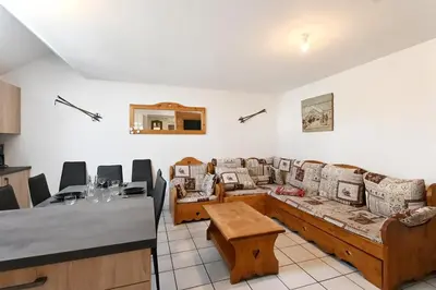Coin salon dans l'établissement Les Marmottes - Charmant Appt pour 7 p