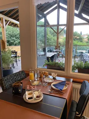 Restaurant ou autre lieu de restauration dans l'établissement Maison Capdet