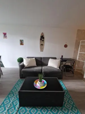 Coin salon dans l'établissement l'appart en rez de jardin