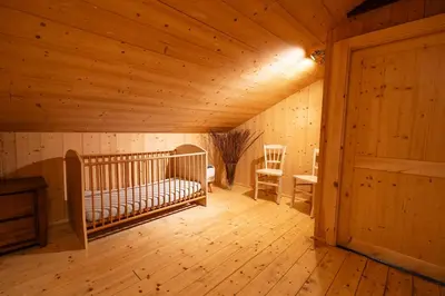 Un ou plusieurs lits dans un hébergement de l'établissement Aux Sources - 14 personnes - sauna & jacuzzi