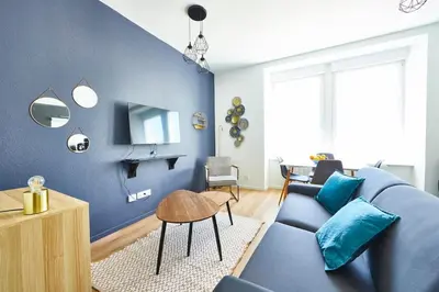 Coin salon dans l'établissement 2 pièces cosy, tram en face, Wi-Fi rapide