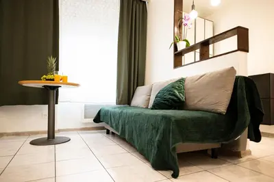 Un ou plusieurs lits dans un hébergement de l'établissement Mega COOL Flat France Suisse