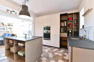 Cuisine ou kitchenette dans l'établissement Gîte les Rosiers du Blosen