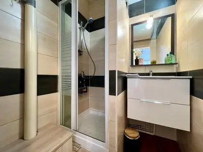 Salle de bains dans l'établissement Le Petit Moulin