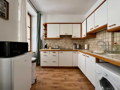 Cuisine ou kitchenette dans l'établissement Le Petit Moulin