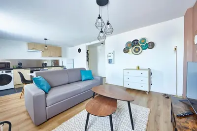 Coin salon dans l'établissement Séjour cosy avec Wi-Fi rapide