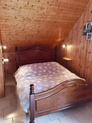 Un ou plusieurs lits dans un hébergement de l'établissement Chambre d'hôte les écureuils