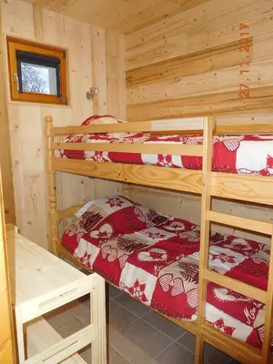 Un ou plusieurs lits dans un hébergement de l'établissement Les Edelweiss