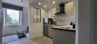 Cuisine ou kitchenette dans l'établissement Appartement lumineux 2 chambres