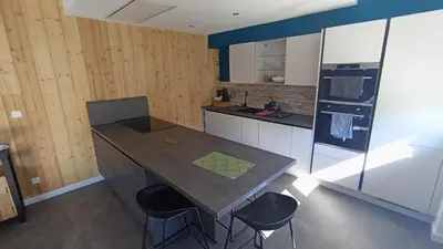 Cuisine ou kitchenette dans l'établissement Comme chez Soi