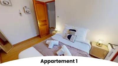 Un ou plusieurs lits dans un hébergement de l'établissement Les appartements au pied du Haut Koenigsbourg