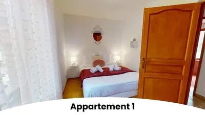 Un ou plusieurs lits dans un hébergement de l'établissement Les appartements au pied du Haut Koenigsbourg