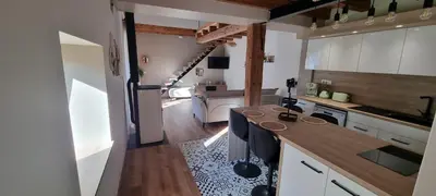 Cuisine ou kitchenette dans l'établissement la grange de Guew