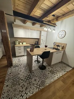 Cuisine ou kitchenette dans l'établissement la grange de Guew