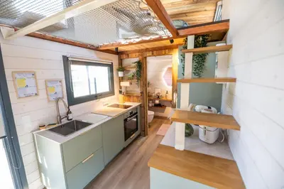 Cuisine ou kitchenette dans l'établissement Tiny House des Cigognes