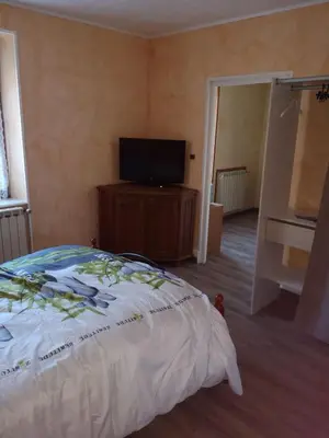 Un ou plusieurs lits dans un hébergement de l'établissement Logement 100 m2 3 chambres 2 salles de bains