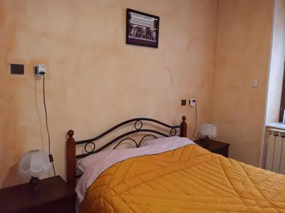 Un ou plusieurs lits dans un hébergement de l'établissement Logement 100 m2 3 chambres 2 salles de bains