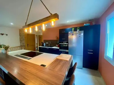 Cuisine ou kitchenette dans l'établissement Aux portes de Colmar