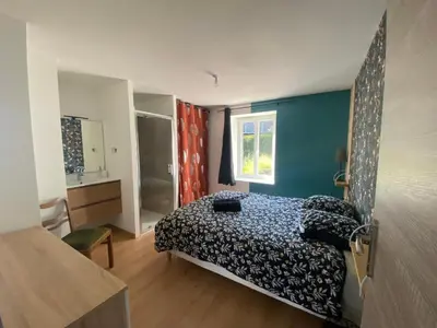 Un ou plusieurs lits dans un hébergement de l'établissement Appartement coquet avec 3 chambres en face des pistes de ski