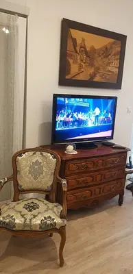 Télévision ou salle de divertissement dans l'établissement Gîte Guldangel