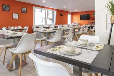 Restaurant ou autre lieu de restauration dans l'établissement Appart'hôtel Odalys City - Colmar Centre