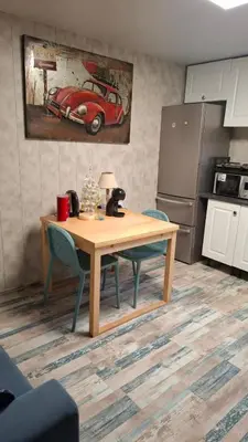 Cuisine ou kitchenette dans l'établissement Logement Sorbier Wattwiller