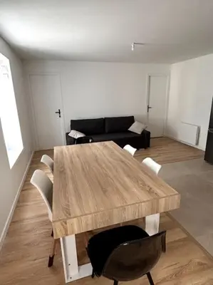 Coin salon dans l'établissement Appartement proche La Bresse
