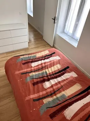 Un ou plusieurs lits dans un hébergement de l'établissement Appartement proche La Bresse